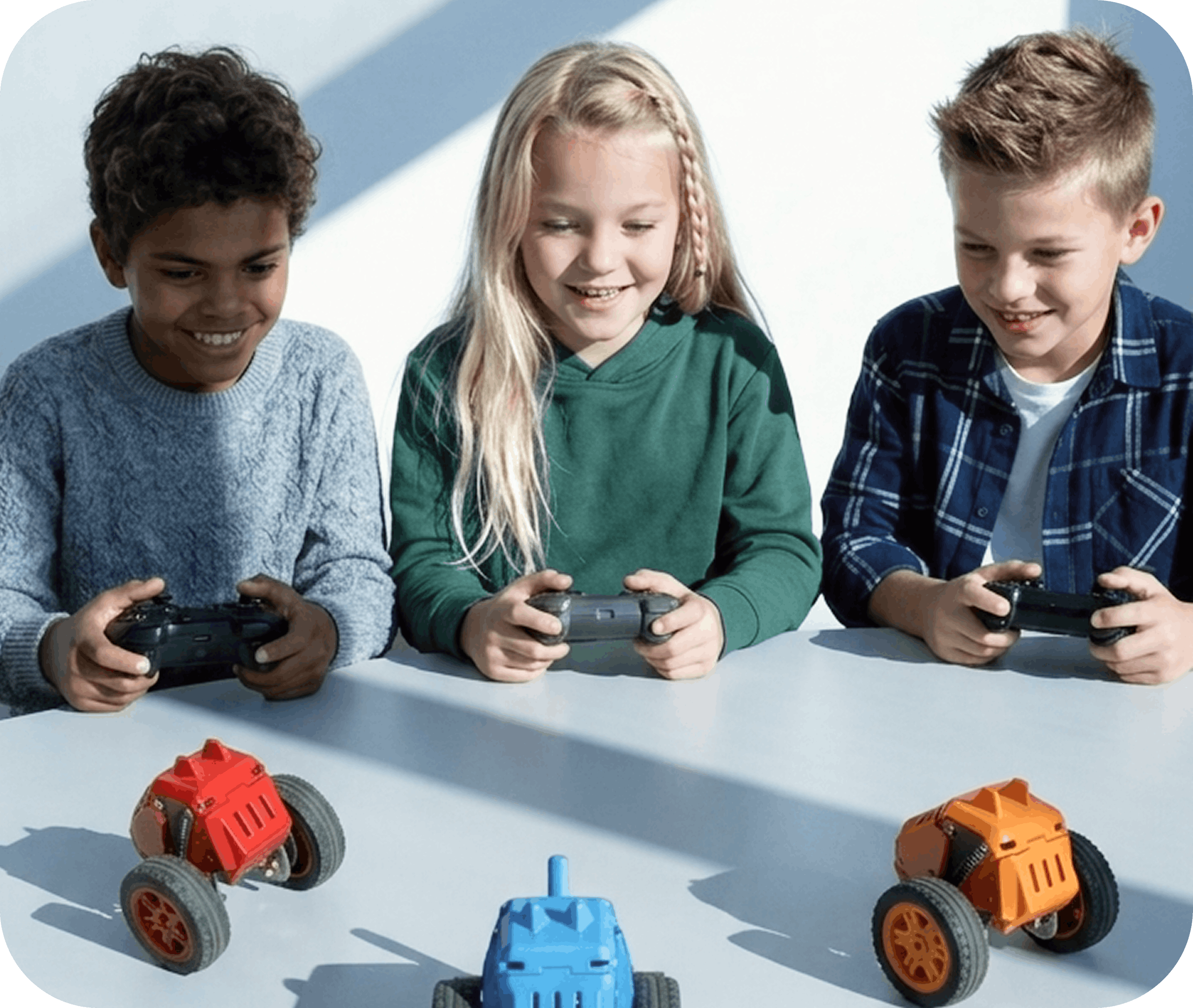 Kids playing with Robomates robots